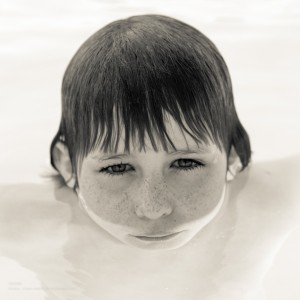 portrait of a boy in water